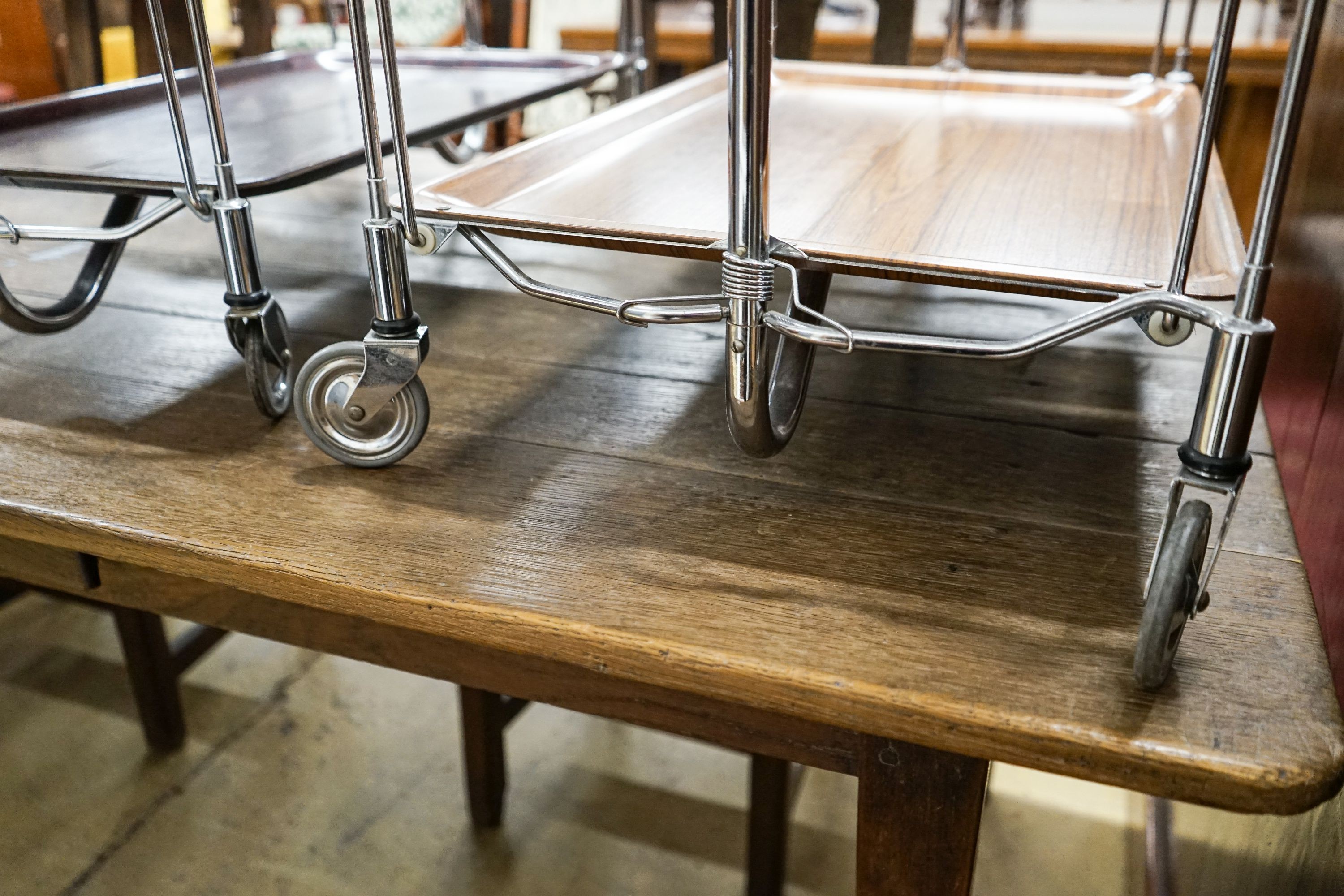 Two mid century Gerlinol Breshley Dinett chrome folding tea trolleys, length 66cm, depth 41cm, height 78cm